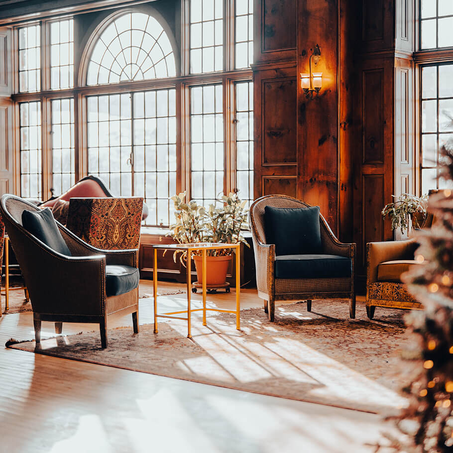 interior of Skytop Lodge with chairs and a Christmas tree