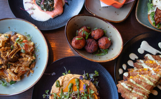 Multiple plates of food on a table